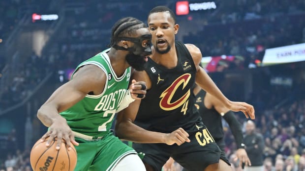 Mar 6, 2023; Cleveland, Ohio, USA; Boston Celtics guard Jaylen Brown (7) drives to the basket against Cleveland Cavaliers forward Evan Mobley (4) during the first quarter at Rocket Mortgage FieldHouse. Mandatory Credit: Ken Blaze-USA TODAY Sports